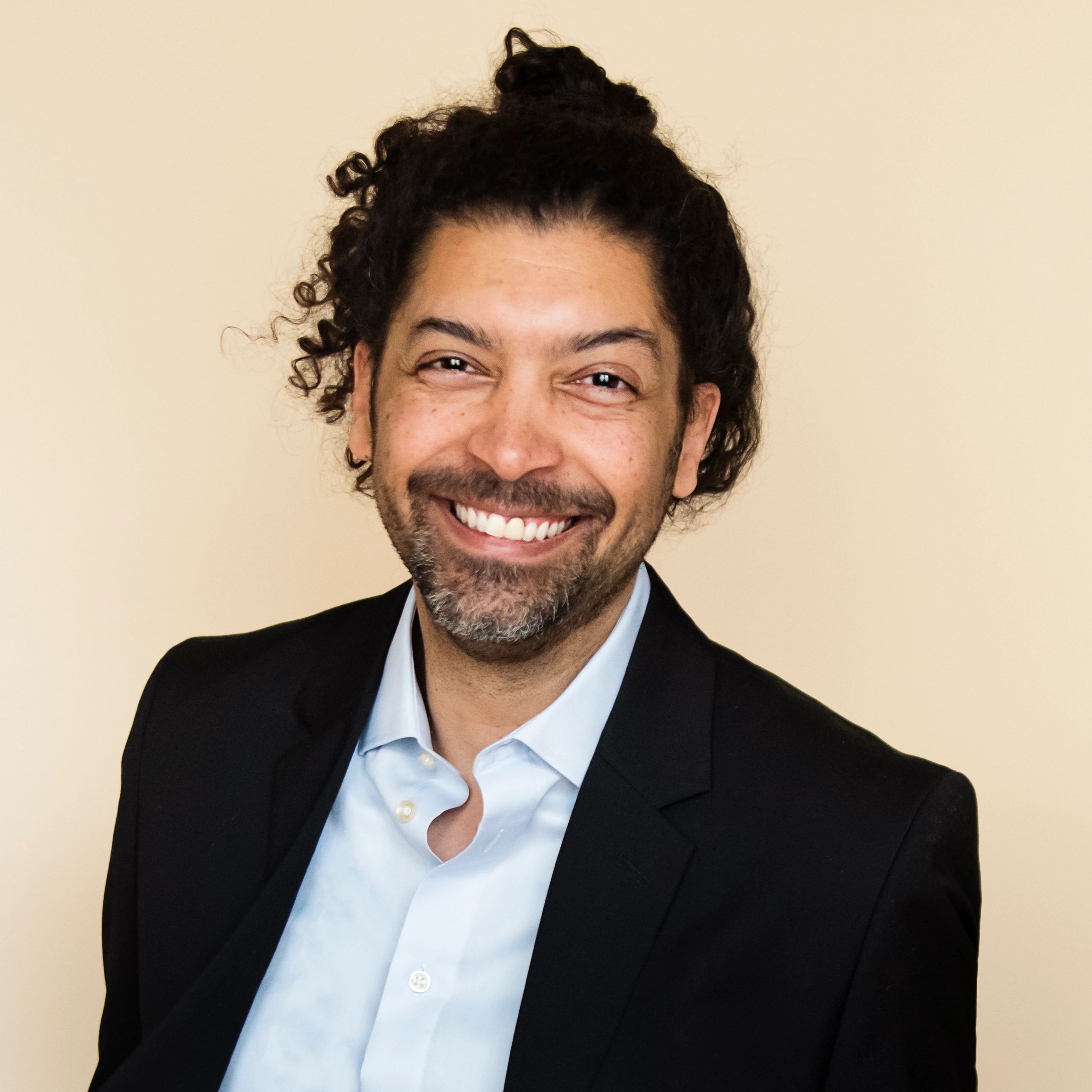 Professional headshot of a business team member