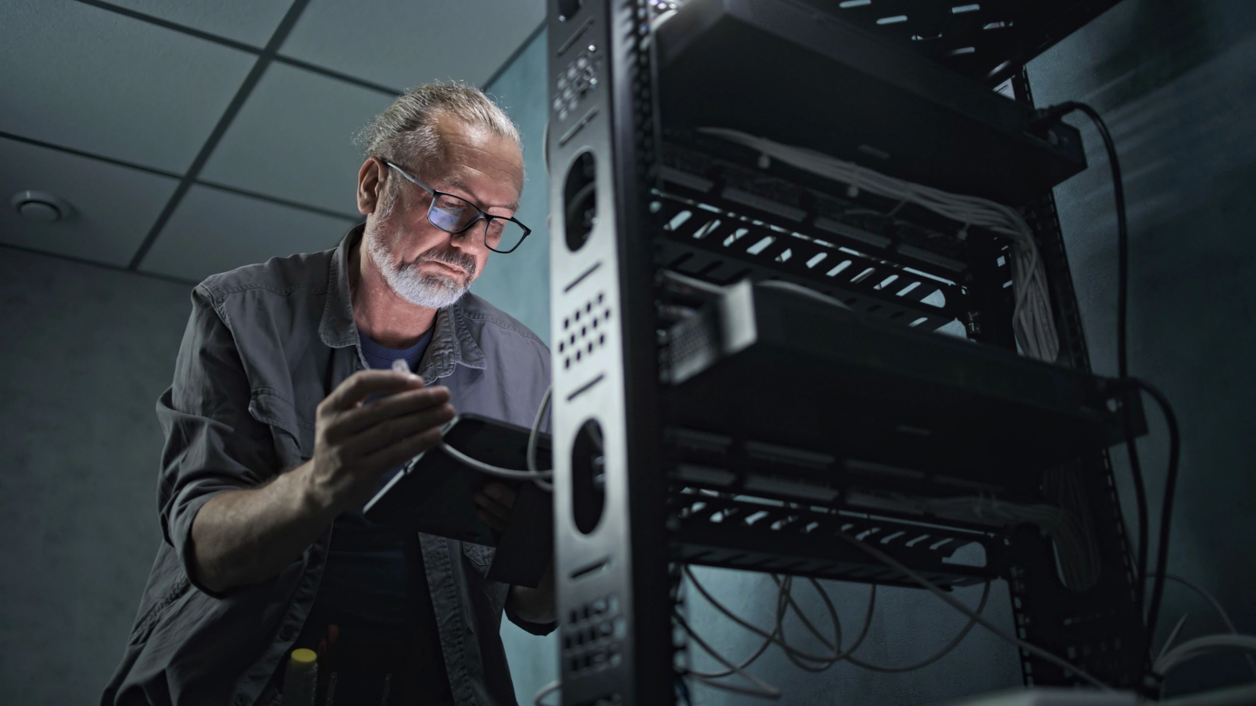 System administrator working in a server room