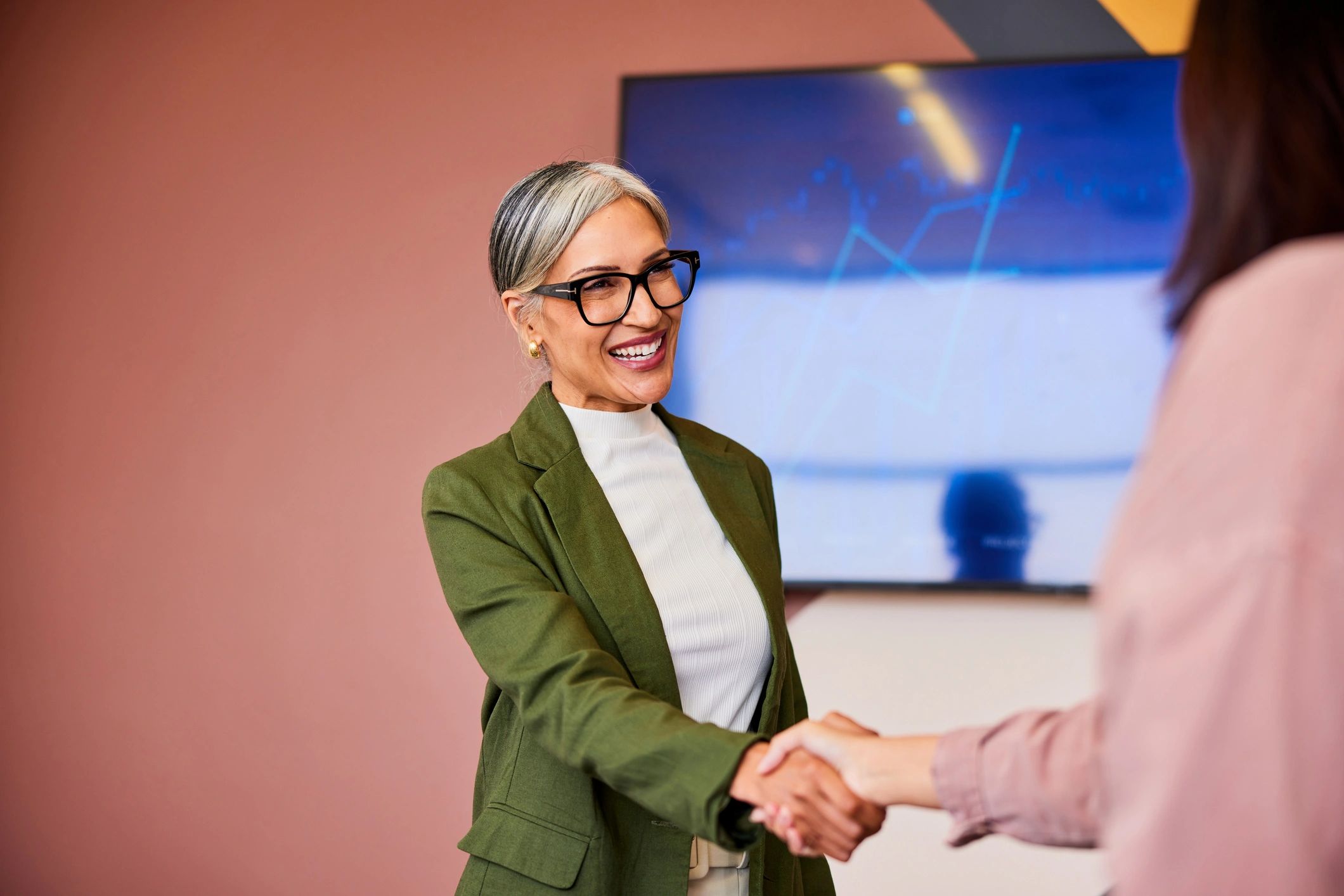 Business handshake symbolizing partnership and agreement
